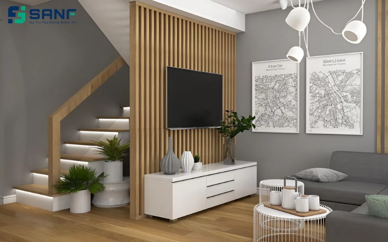 tận dụng vách cầu thang làm kệ tivi